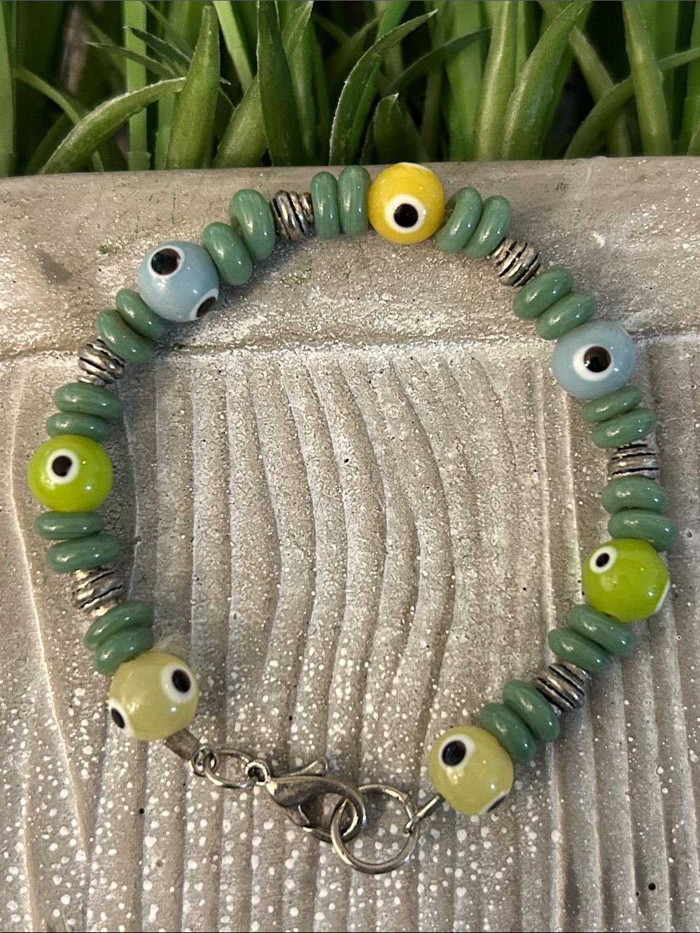 10/$30 glass Beaded Evil Eye Bracelet with silvertone spacers blue green yellow